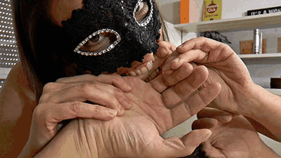 Biting the slaves fingers and hands