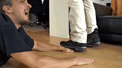 Stomping the slaves hands hard